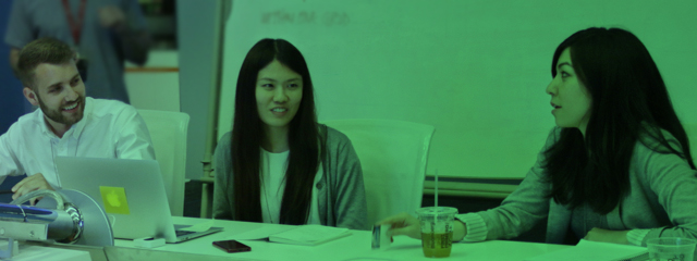 Eric, Melissa and Anna in a design crit session.