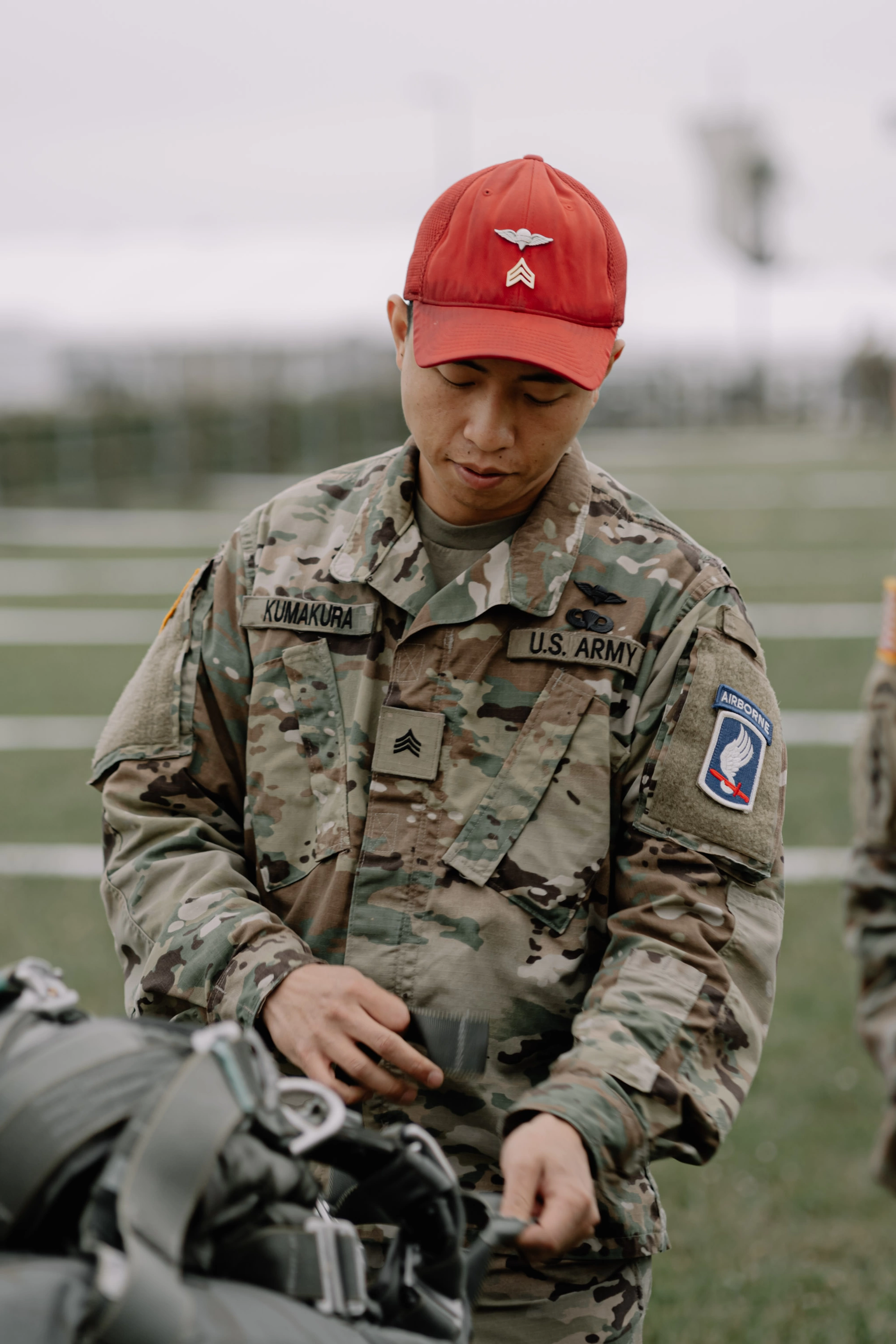 An inspector checking a T-11 Parachute