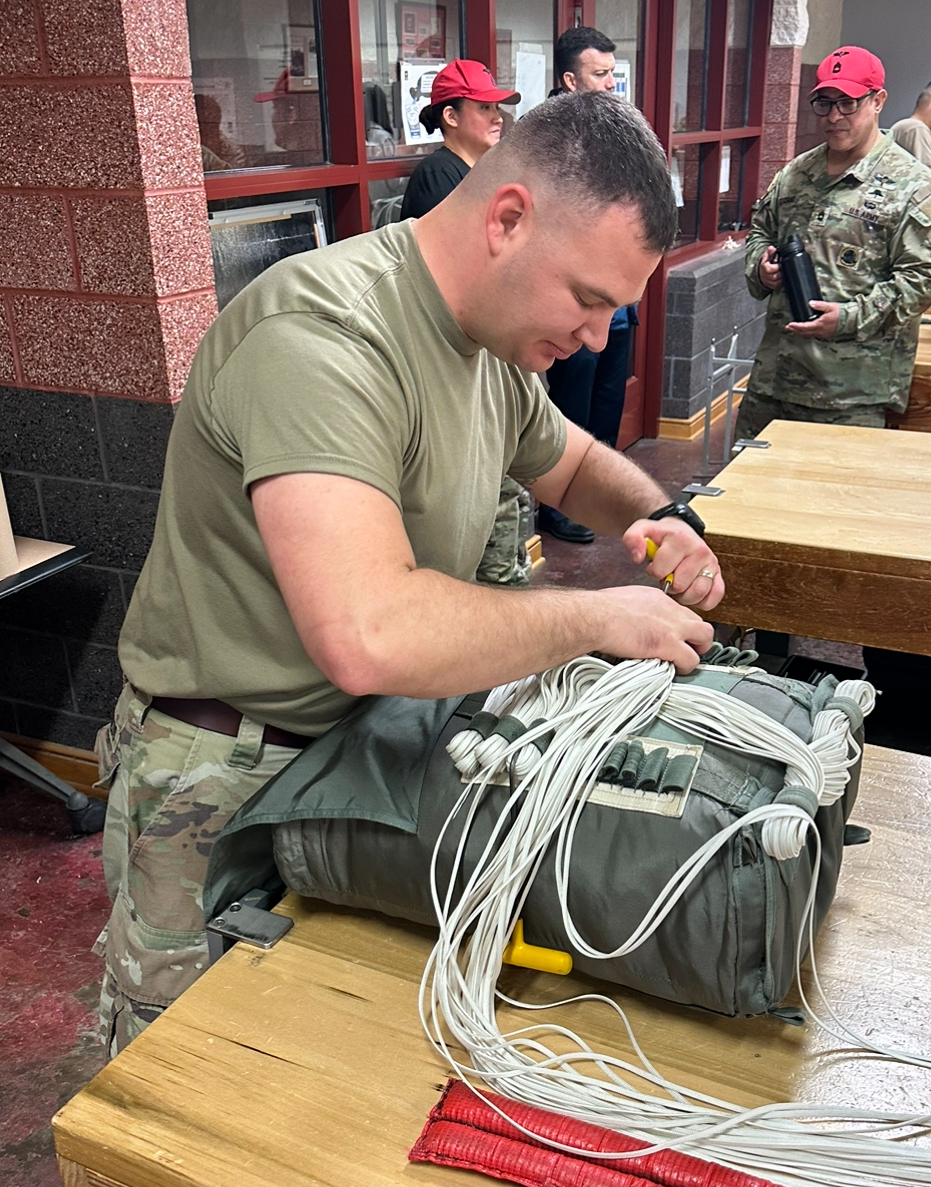 Rigger Stowing the Lines in the Deployment Bag
