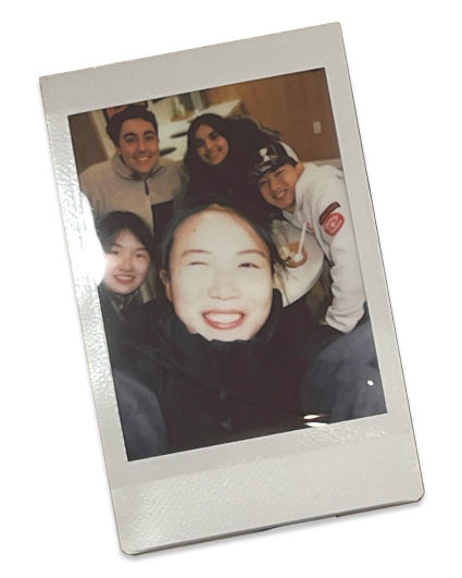 Polaroid of team selfie, with Ayumi taking the photo