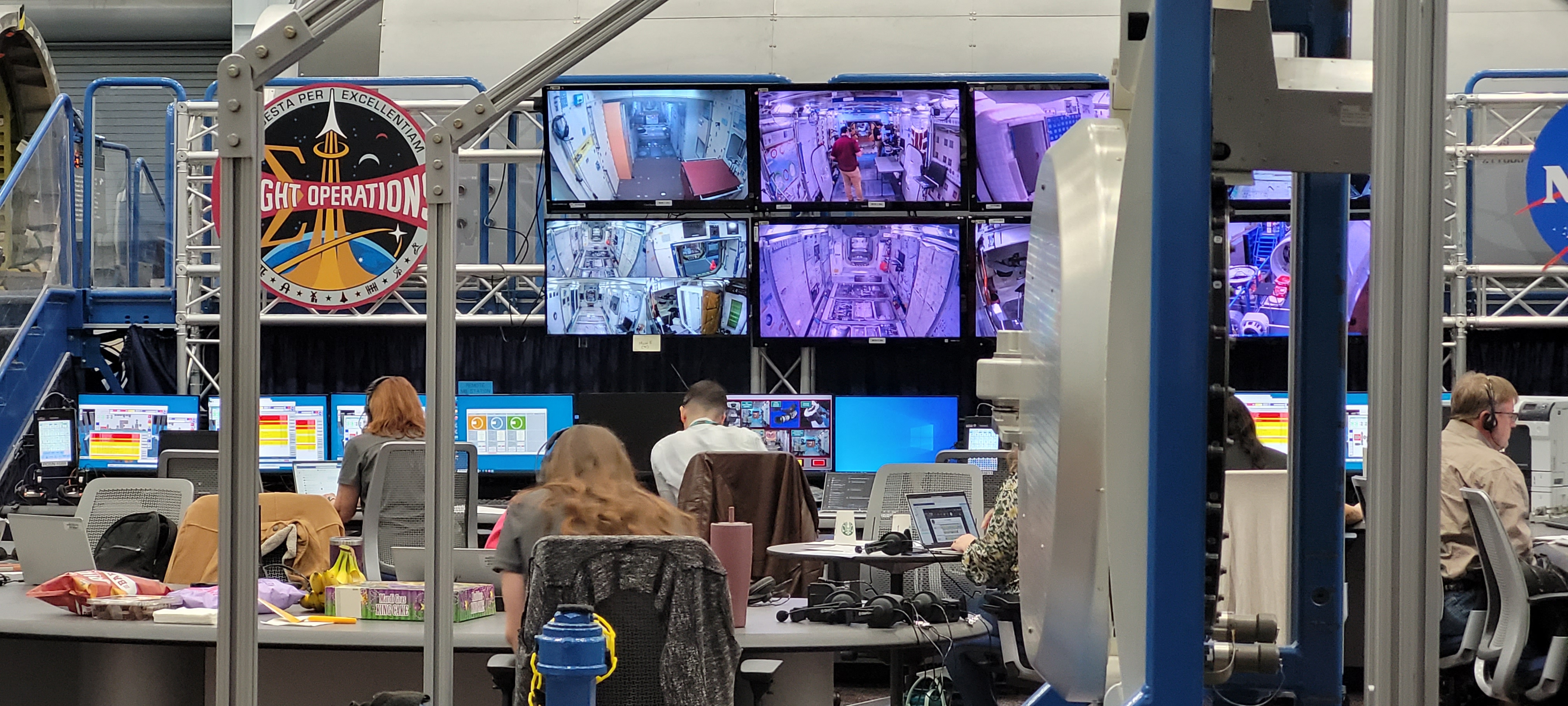 Cameras and computers monitoring people going through emergency training