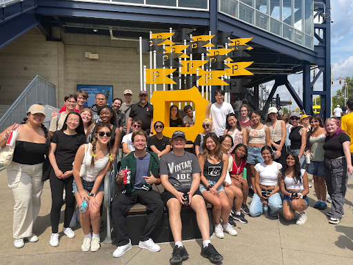 large group of folks from the HCII attending a baseball game last summer