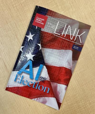 Fall 2024 issue of The Link magazine on a table, the cover is a close up of the American flag