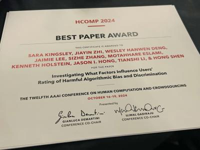 the paper certificate the team received for their HCOMP 2024 Best Paper award 