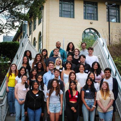 group photo of the summer 2024 researchers standing on a staircase outside