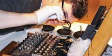 Sven Mayer looks inside an Enigma machine 