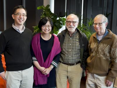 Hong, Zhang, Kraut and Siewiorek stand side by side, smiling 