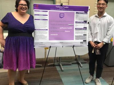 faculty advisor and student at poster session