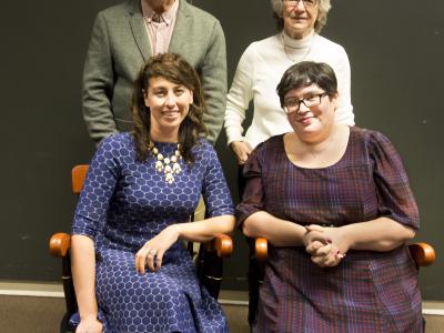 Tom and Lydia Moran stand behind professors Jessica Hammer and Amy Ogan (seated)