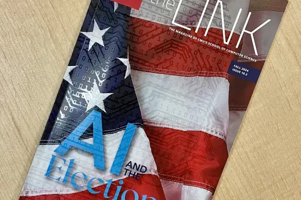 Fall 2024 issue of The Link magazine on a table, the cover is a close up of the American flag