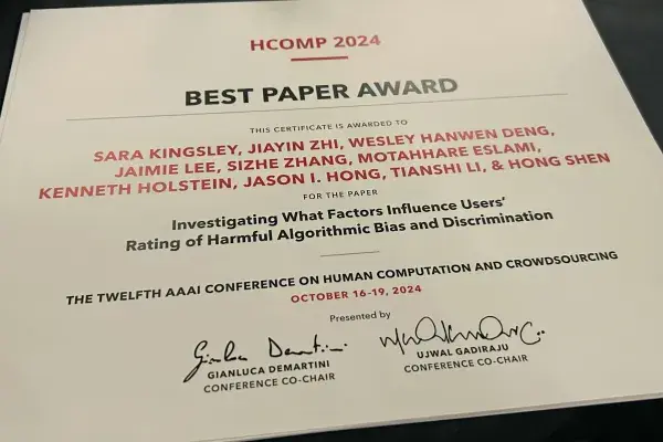 the paper certificate the team received for their HCOMP 2024 Best Paper award