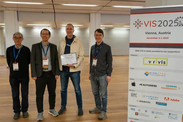 four of the authors of the Voyager paper receive the 5 Year InfoVis Award