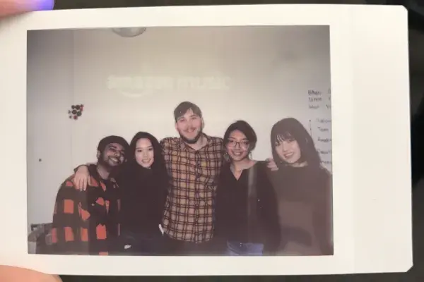 Polaroid photo of the 5 students on this team