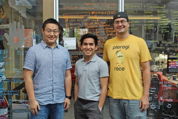 Guo, Laput and Taylor, the 3 Innovation Fellows from the HCII, stand side by side in the lab