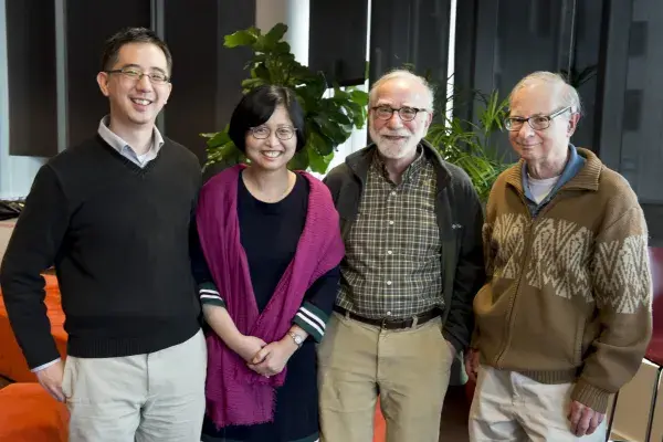 Hong, Zhang, Kraut and Siewiorek stand side by side, smiling