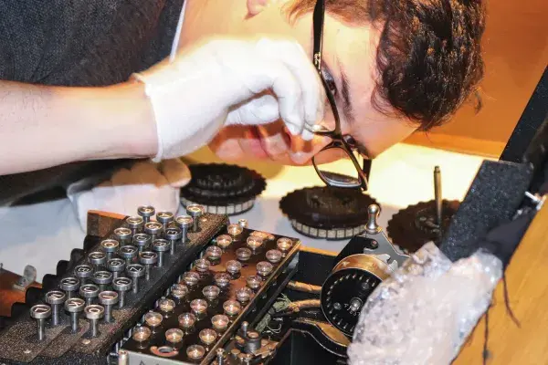 Sven Mayer looks inside an Enigma machine